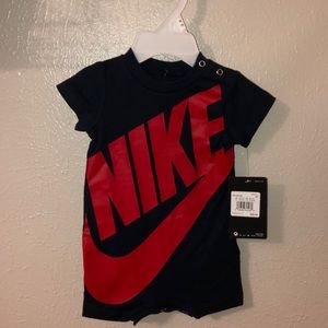 Baby boy navy romper with red NIKE.